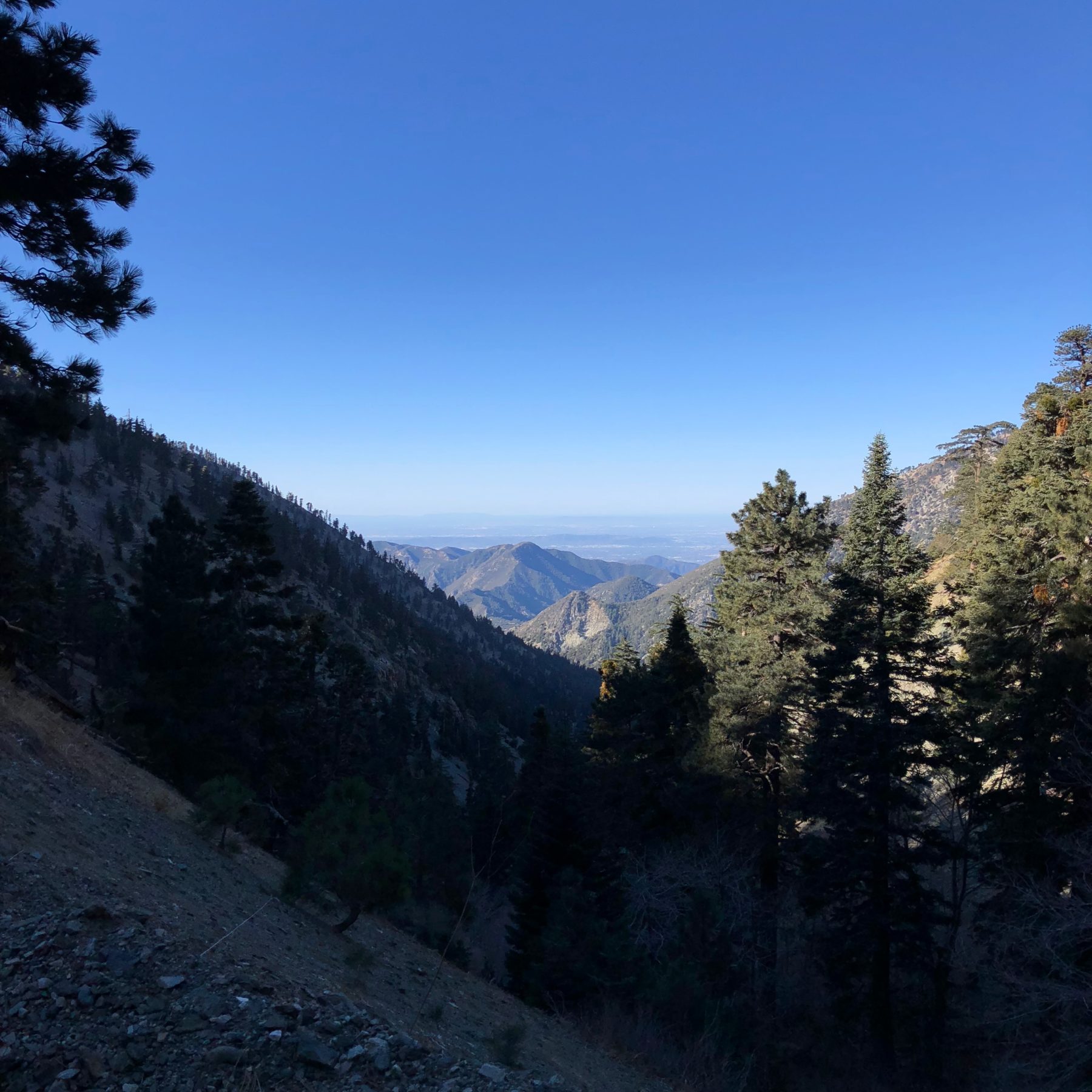 Malibu / Mt. Baldy - It was an early start to the Mt Baldy trailhead. Don’t be fooled by the clear blue skies – it was below freezing in the early morning. And we were the only car in the parking lot at the Manker Campground. Malibu / Mt. Baldy - It was an early start to the Mt Baldy trailhead. Don’t be fooled by the clear blue skies – it was below freezing in the early morning. And we were the only car in the parking lot at the Manker Campground.