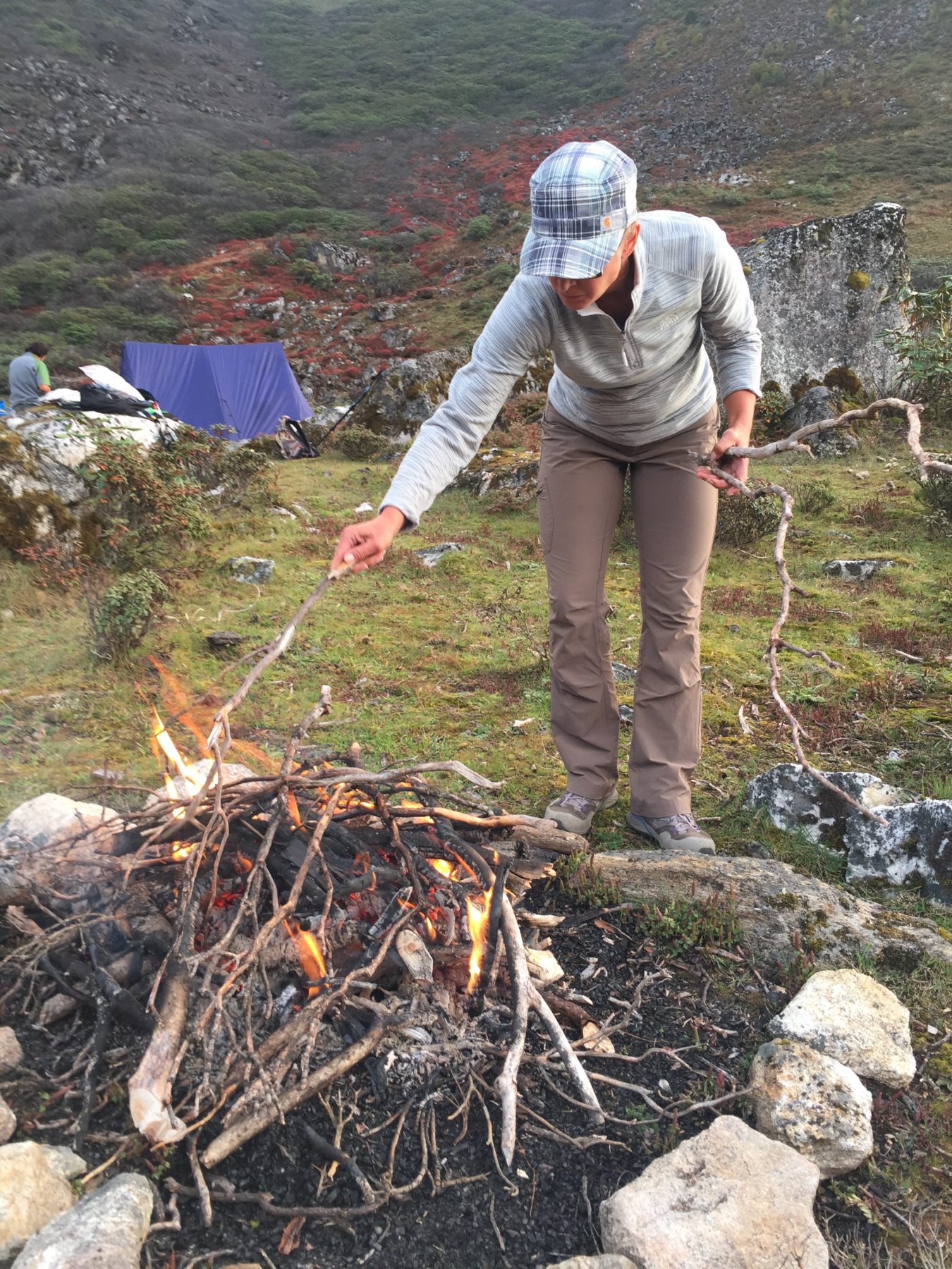 Bhutan Dagala Trek - Dagmara is a pro at fire building, thanks to her years in Girl Scouts and Latvian Girl Guides. Bhutan Dagala Trek - Dagmara is a pro at fire building, thanks to her years in Girl Scouts and Latvian Girl Guides.