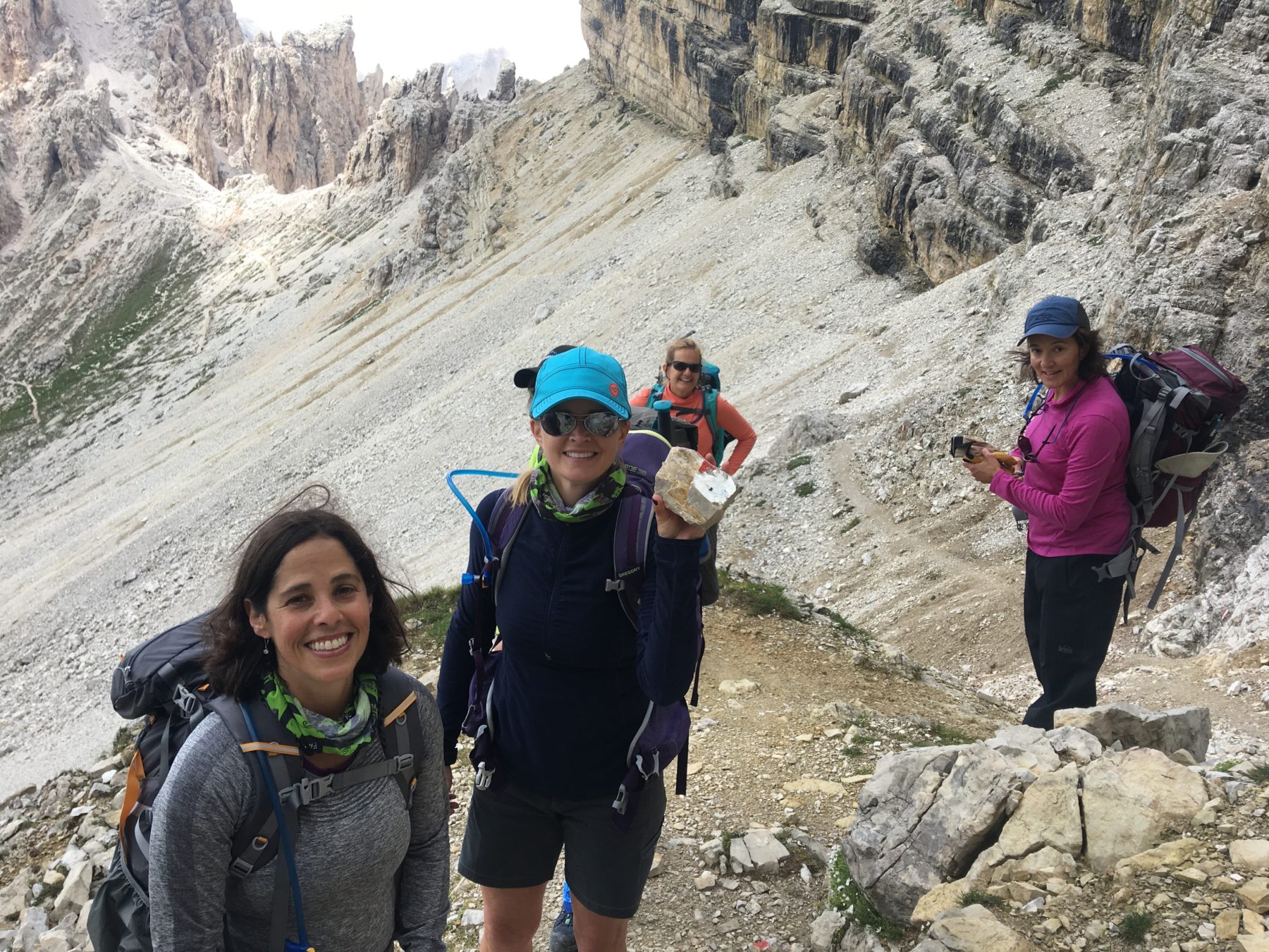 Dolomites, Italy - In Italy, the trail signs are painted on rocks. And rocks are prone to crumbling or chipping away. Dolomites, Italy - In Italy, the trail signs are painted on rocks. And rocks are prone to crumbling or chipping away.