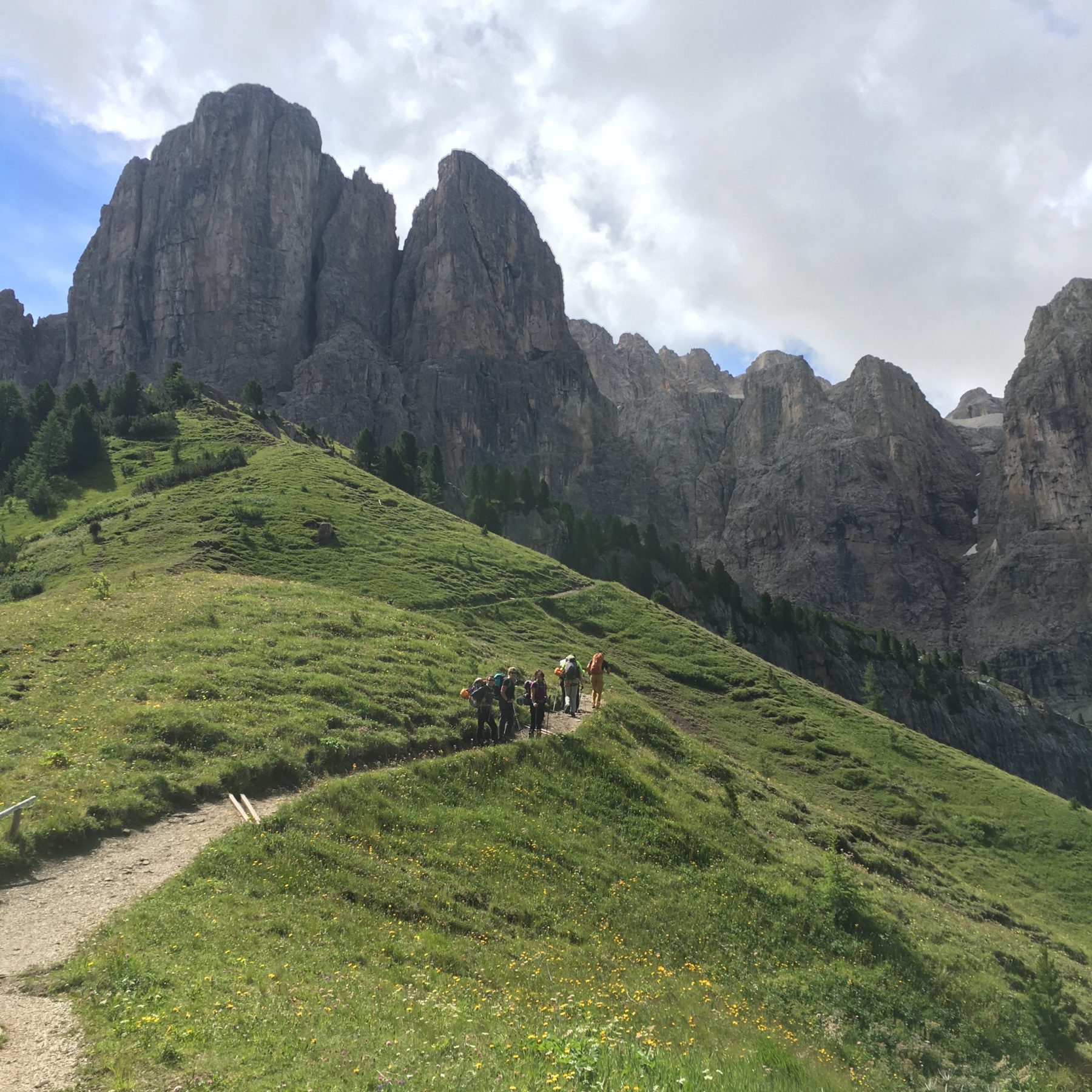 Dolomites, Italy - After a coffee break, we met up with our ferrata guide, Marco. He brought our harnesses and helmets for the Via Ferrata Tridentina. Dolomites, Italy - After a coffee break, we met up with our ferrata guide, Marco. He brought our harnesses and helmets for the Via Ferrata Tridentina.