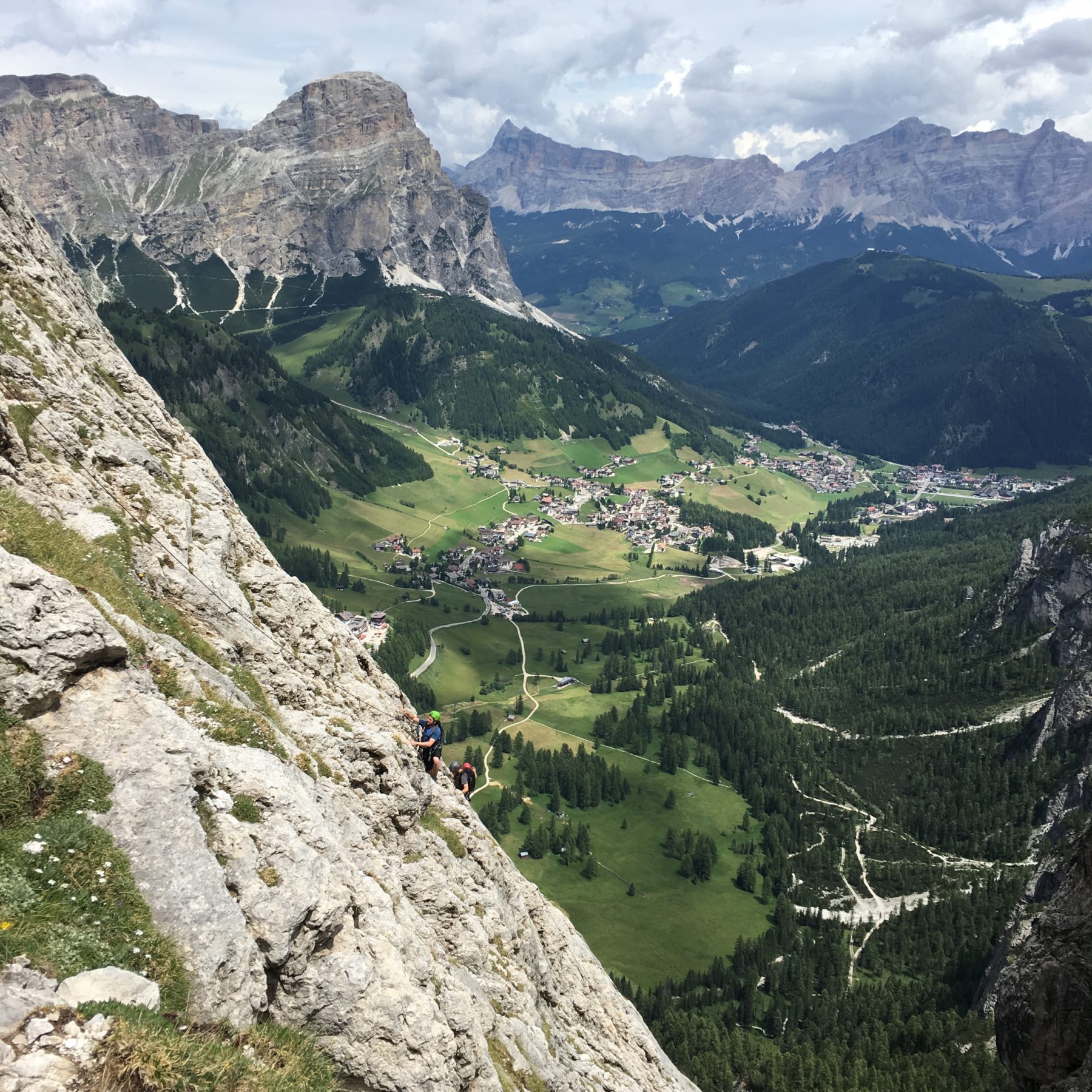 Dolomites, Italy - Via ferrata are popular! These are the climbers after us, who became part of our story, and a view of Corvara below. Dolomites, Italy - Via ferrata are popular! These are the climbers after us, who became part of our story, and a view of Corvara below.
