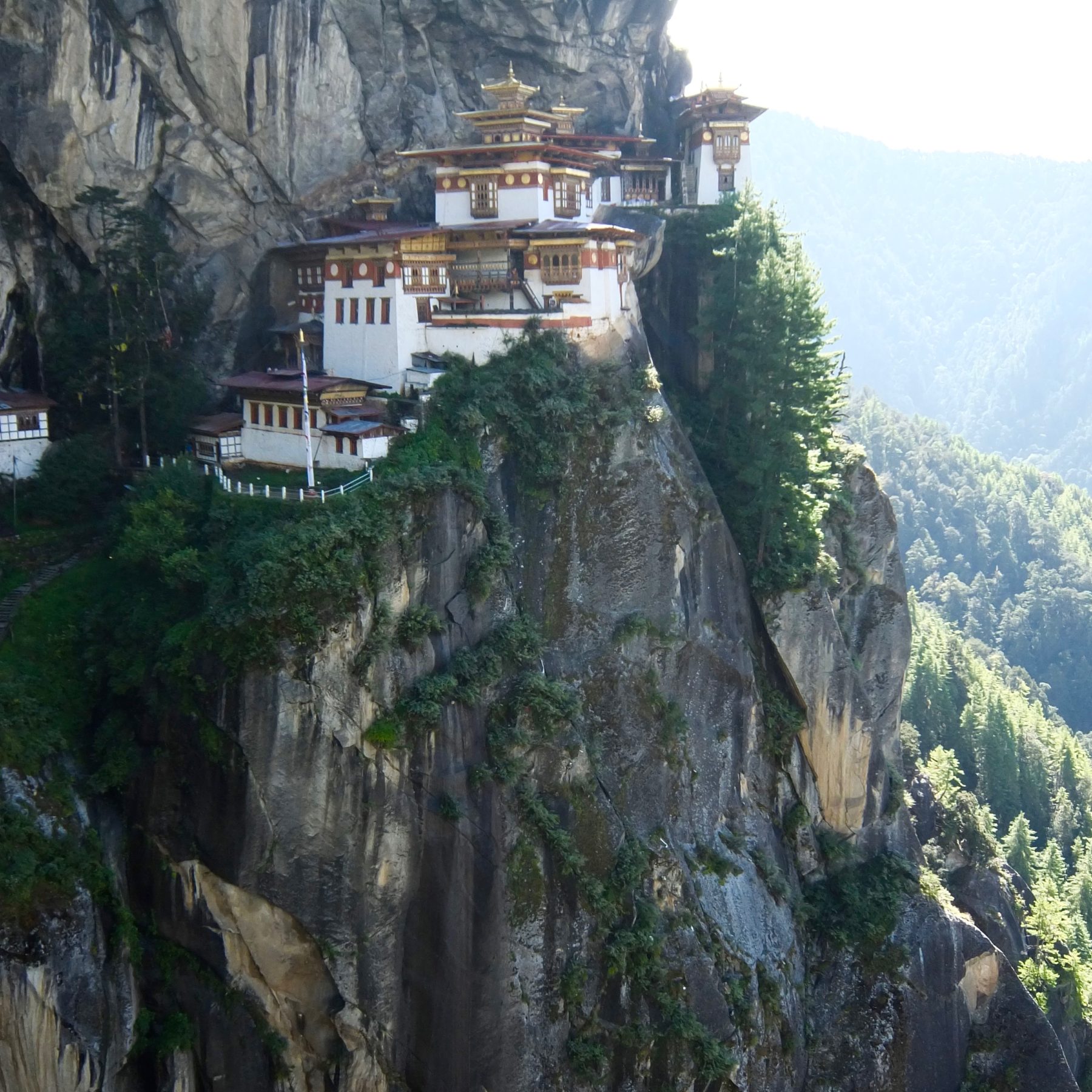 Bhutan Dagala Trek - Tiger’s Nest hangs impossibly on the side of a mountain at 3120m above sea level. Visitors are allowed inside but not allowed to disturb the monks or take pictures. Bhutan Dagala Trek - Tiger’s Nest hangs impossibly on the side of a mountain at 3120m above sea level. Visitors are allowed inside but not allowed to disturb the monks or take pictures.