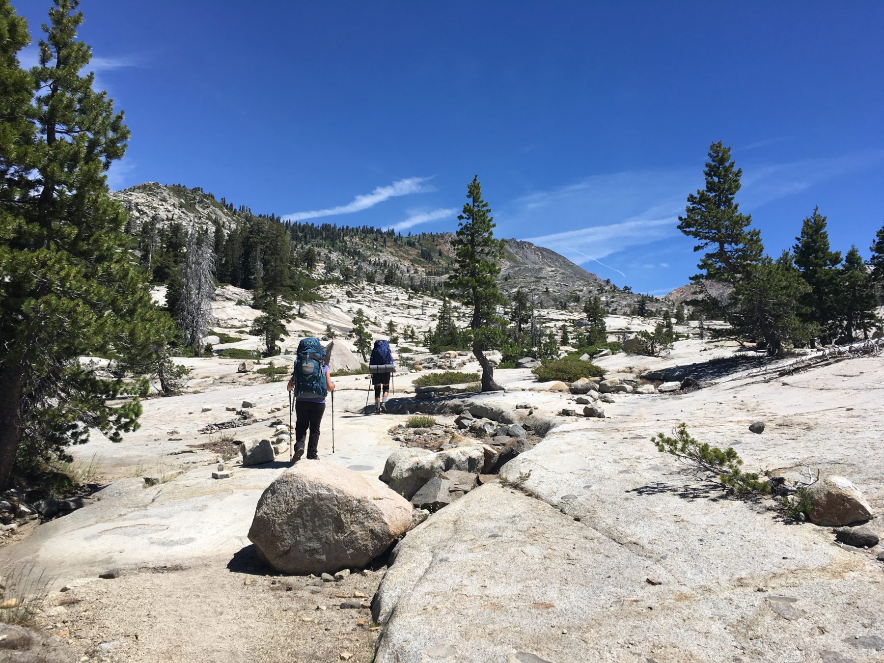 Desolation Wilderness California - The Desolation Wilderness is wide open slabs of granite. Some sections of the trail are indicated by stone borders or cairns. Desolation Wilderness California - The Desolation Wilderness is wide open slabs of granite. Some sections of the trail are indicated by stone borders or cairns.