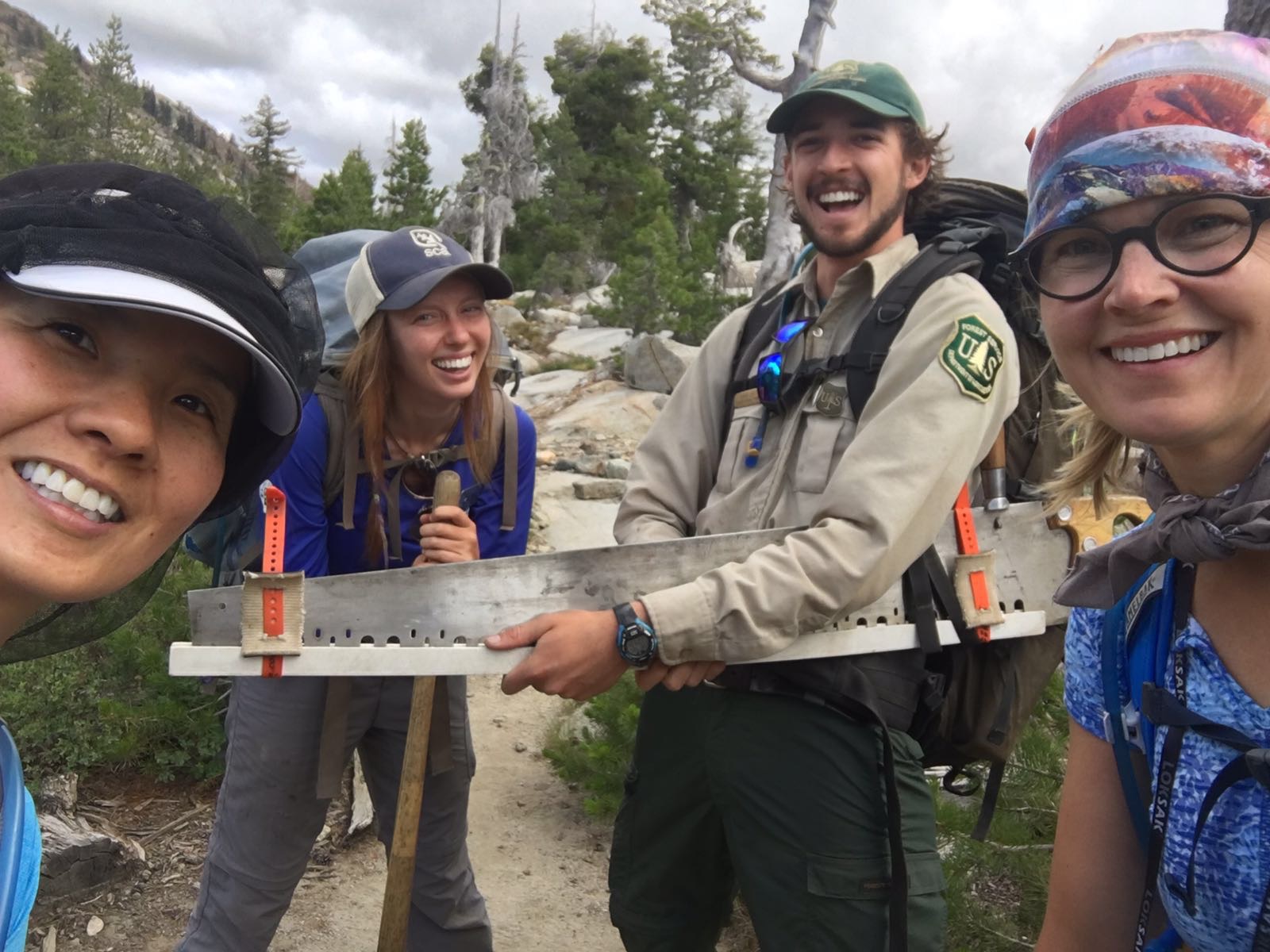 Desolation Wilderness California - We were getting very worried when we ran into these two park rangers doing some much-needed trail maintenance. They directed us back to the trail, granted our selfie request and accepted one of our snack bars. Before we parted ways, they asked to see our camping permit. “Uhh, would you believe we left that in camp as well?” Lesson learned: don’t leave home without it; any of it. Desolation Wilderness California - We were getting very worried when we ran into these two park rangers doing some much-needed trail maintenance. They directed us back to the trail, granted our selfie request and accepted one of our snack bars. Before we parted ways, they asked to see our camping permit. “Uhh, would you believe we left that in camp as well?” Lesson learned: don’t leave home without it; any of it.