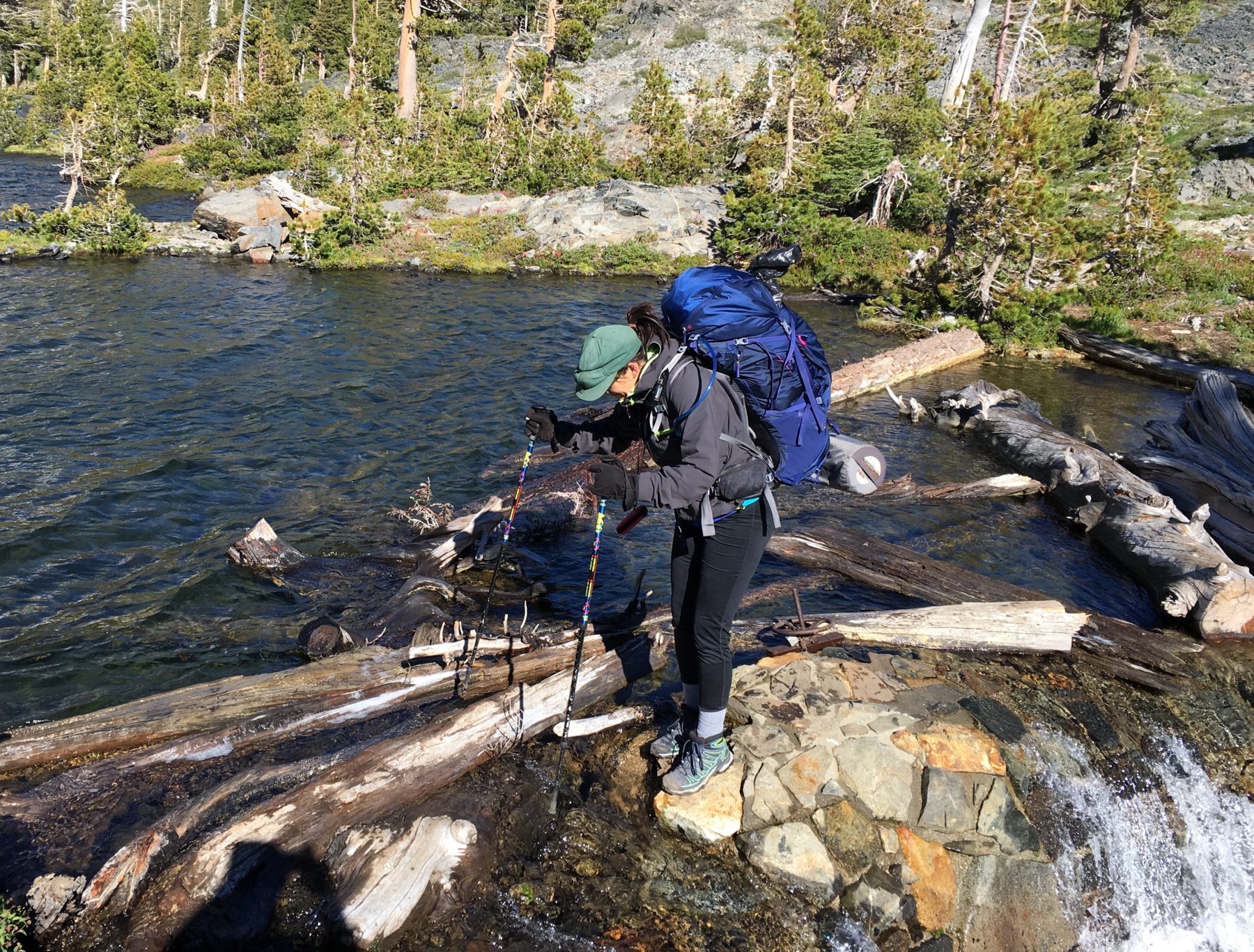 Desolation Wilderness California - A makeshift bridge was the only way to reach our campsite at Lake Lois.. Desolation Wilderness California - A makeshift bridge was the only way to reach our campsite at Lake Lois..