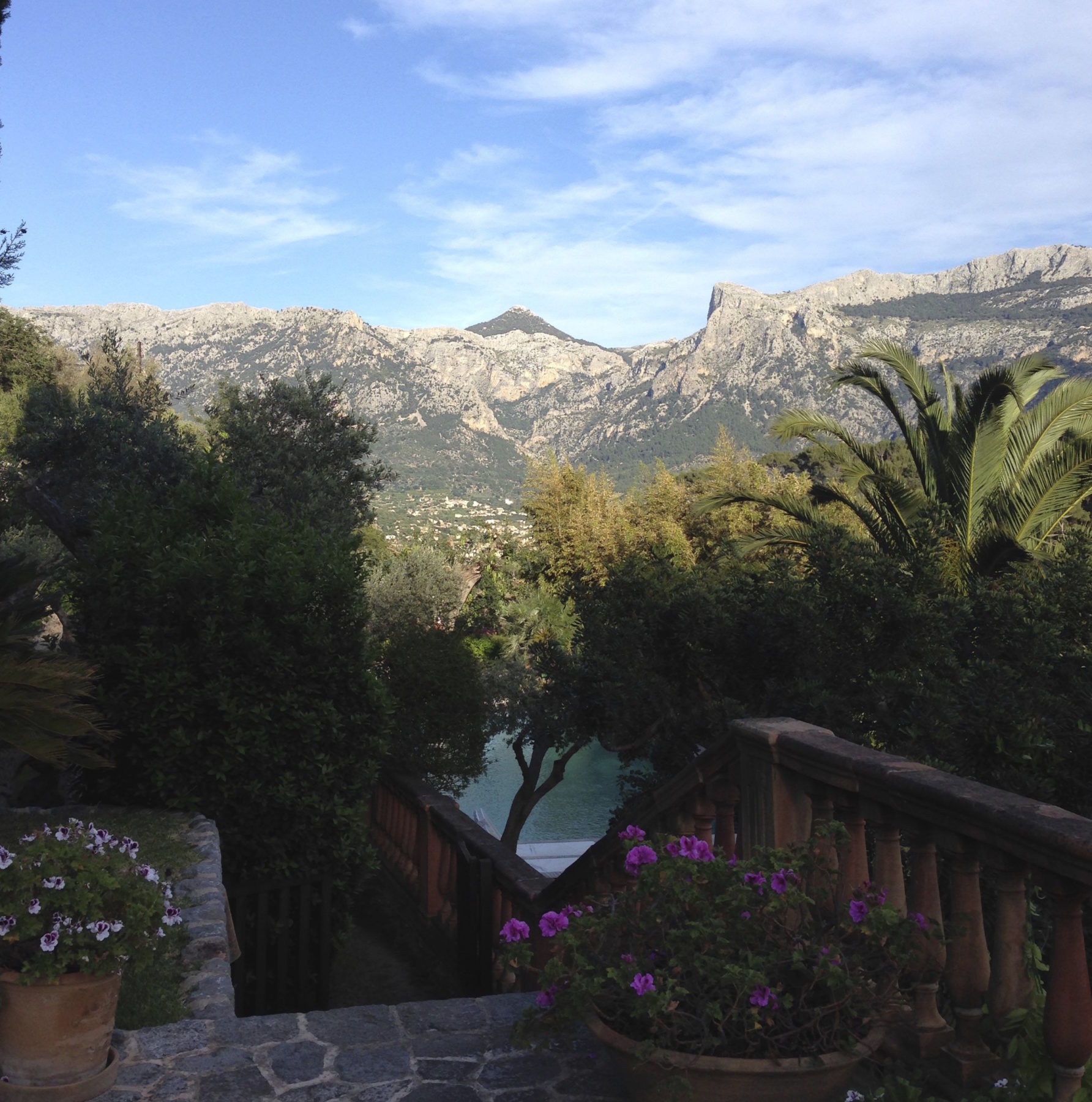 Mallorca, Spain - Safely back, comfortably resting at our rented villa in Mallorca, we realize we have a direct line view of the peak we just climbed. Mallorca, Spain - Safely back, comfortably resting at our rented villa in Mallorca, we realize we have a direct line view of the peak we just climbed.