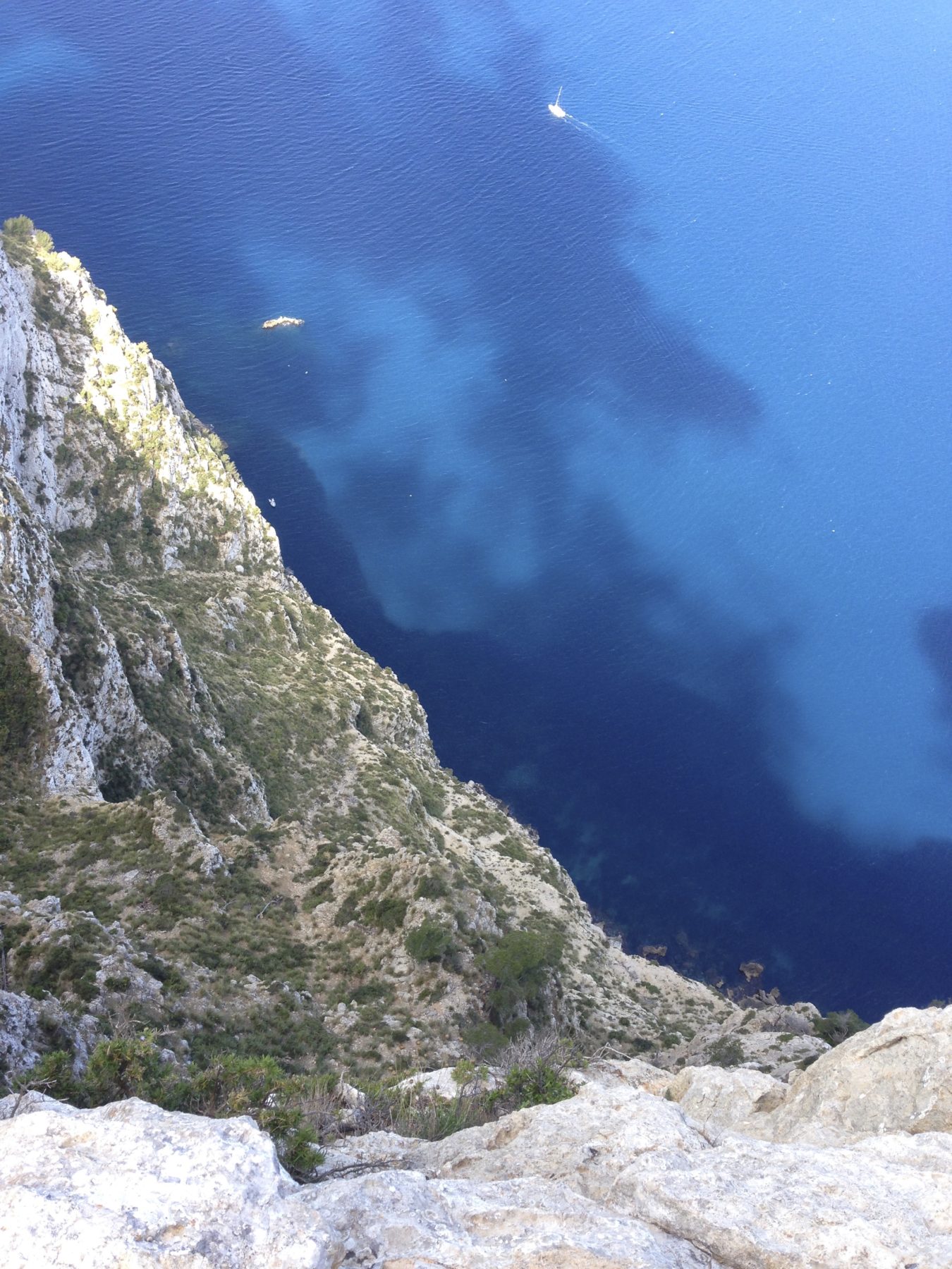 Mallorca, Spain - Don’t look down if you’re afraid of heights! But how could you not when the water is so mesmerizing. Mallorca, Spain - Don’t look down if you’re afraid of heights! But how could you not when the water is so mesmerizing.