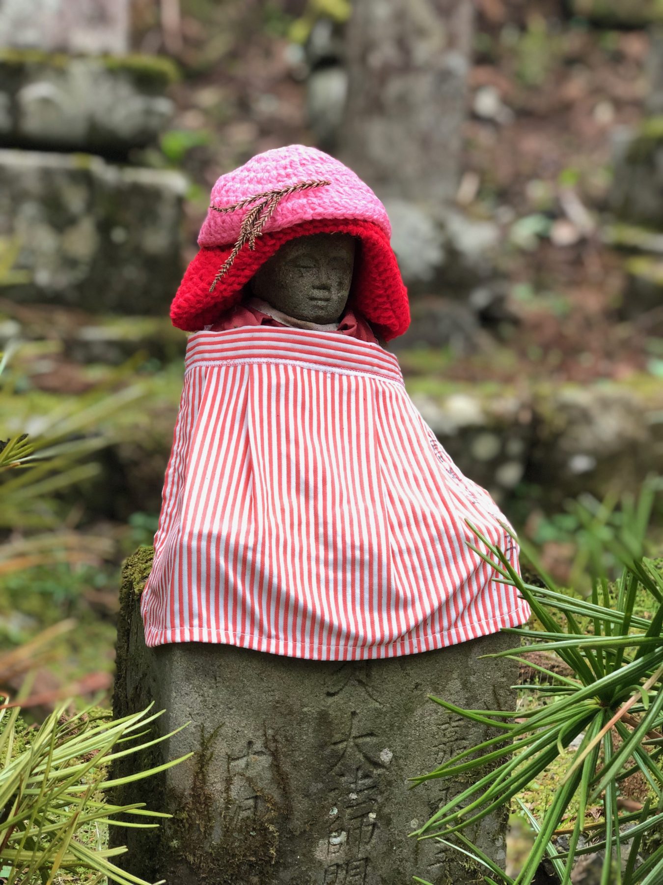 Kumano Kodo, Japan - The most beloved Buddhist deity in Japan, Jizo is the protector of travelers, children and the souls of the deceased. Travelers and parents adorn the statues with hand-knitted beanies and hand-sewn bibs to say thanks. We encountered countless Jizo statues along the trails in Japan and we took time to pause a moment, and offer our respects for keeping us safe on our travels. 🙏🏼 Kumano Kodo, Japan - The most beloved Buddhist deity in Japan, Jizo is the protector of travelers, children and the souls of the deceased. Travelers and parents adorn the statues with hand-knitted beanies and hand-sewn bibs to say thanks. We encountered countless Jizo statues along the trails in Japan and we took time to pause a moment, and offer our respects for keeping us safe on our travels. 🙏🏼